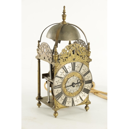 1080 - JOHN GOODMAN, AN EARLY 18TH CENTURY BRASS LANTERN CLOCK, having a posted frame and large steel bell ... 