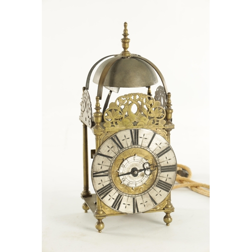 1080 - JOHN GOODMAN, AN EARLY 18TH CENTURY BRASS LANTERN CLOCK, having a posted frame and large steel bell ... 