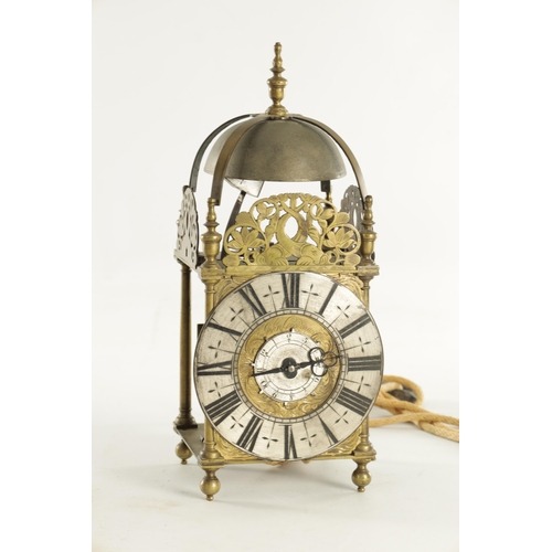 1080 - JOHN GOODMAN, AN EARLY 18TH CENTURY BRASS LANTERN CLOCK, having a posted frame and large steel bell ... 