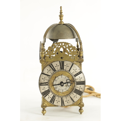 1080 - JOHN GOODMAN, AN EARLY 18TH CENTURY BRASS LANTERN CLOCK, having a posted frame and large steel bell ... 