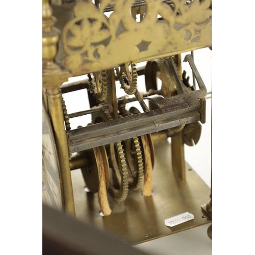 1080 - JOHN GOODMAN, AN EARLY 18TH CENTURY BRASS LANTERN CLOCK, having a posted frame and large steel bell ... 