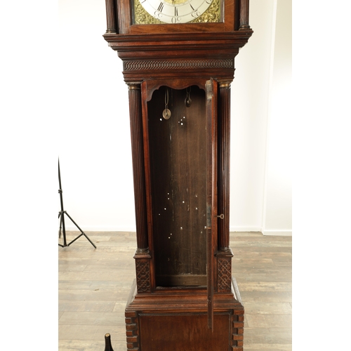 1087 - ISAAC YOUNG, LIVERPOOL. A GEORGE III FIGURED MAHOGANY LONGCASE CLOCK the hood with swan neck pedimen... 