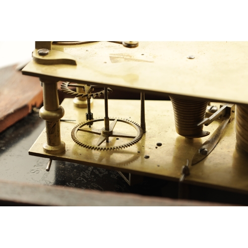 1097 - A LATE REGENCY FIGURED MAHOGANY CONVEX DIAL WALL CLOCK, having a brass inlaid case with carved fan e... 