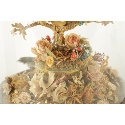 1098 - A LATE 19TH CENTURY FRENCH ROTATING TAXIDERMY BIRD CLOCK, having hummingbirds perched on a central r... 