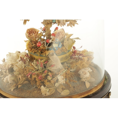 1098 - A LATE 19TH CENTURY FRENCH ROTATING TAXIDERMY BIRD CLOCK, having hummingbirds perched on a central r... 