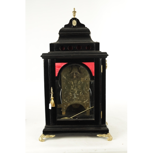 1102 - SPENCER & PERKINS, LONDON. A GEORGE III EBONIZED ORMOLU MOUNTED BRACKET CLOCK, having a bell top ped... 