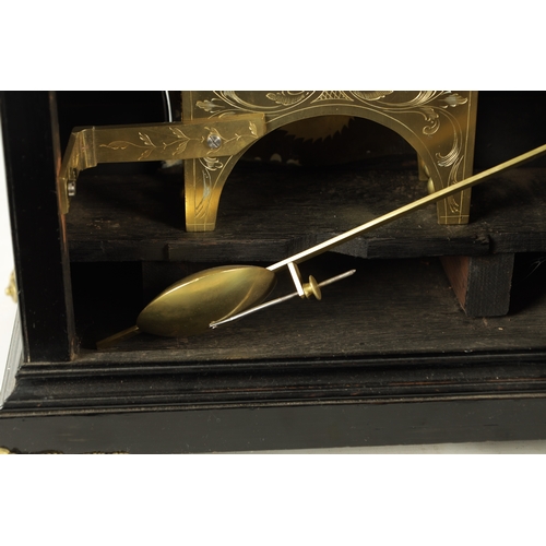 1102 - SPENCER & PERKINS, LONDON. A GEORGE III EBONIZED ORMOLU MOUNTED BRACKET CLOCK, having a bell top ped... 