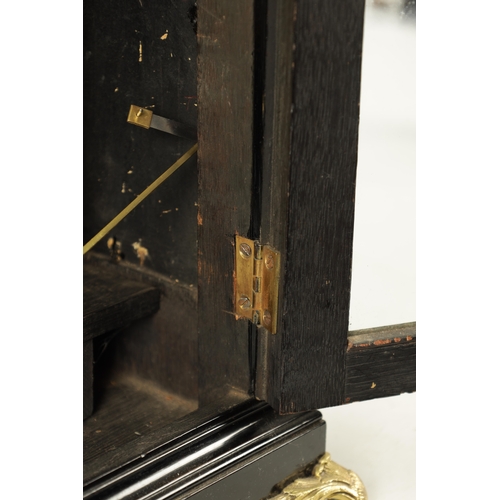 1102 - SPENCER & PERKINS, LONDON. A GEORGE III EBONIZED ORMOLU MOUNTED BRACKET CLOCK, having a bell top ped... 