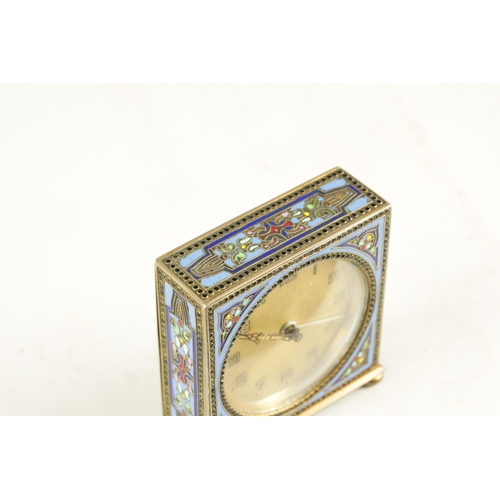 1103 - A 1930’S KIENZLE GERMAN CHAMPLEVE ENAMEL ALARM CLOCK the square silvered case raised on bun feet enc... 