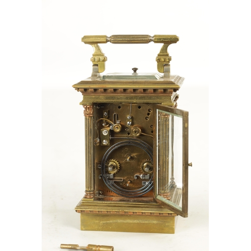 1108 - A LATE 19TH CENTURY FRENCH REPEATING CARRIAGE CLOCK the brass case with reeded Corinthian corner col... 