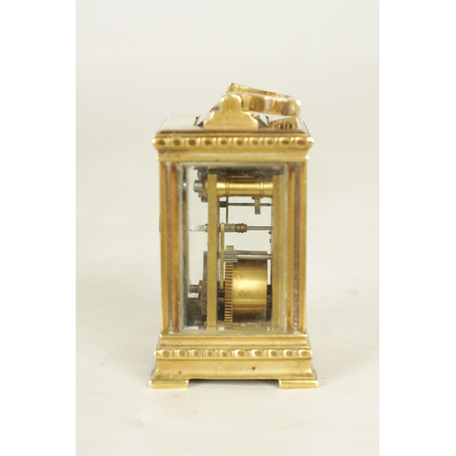 1111 - A LATE 19TH CENTURY FRENCH BRASS CARRIAGE CLOCK OF TINY PROPORTIONS the decorative case with flower ... 