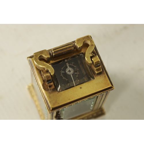 1111 - A LATE 19TH CENTURY FRENCH BRASS CARRIAGE CLOCK OF TINY PROPORTIONS the decorative case with flower ... 