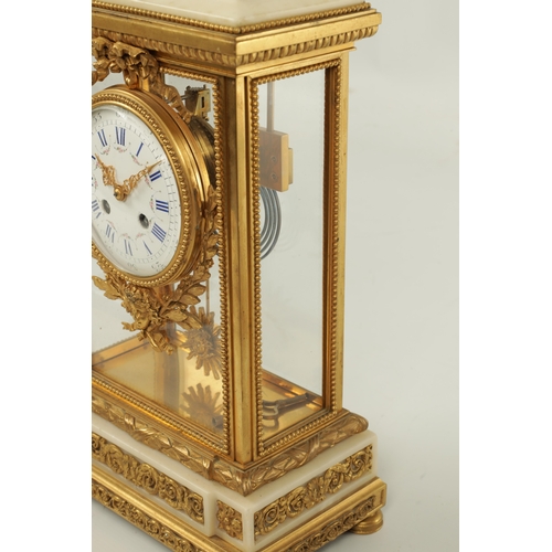 1112 - A FINE LATE 19TH CENTURY GILT BRASS AND WHITE MARBLE FRENCH EMPIRE STYLE MANTEL CLOCK the stylish ca... 