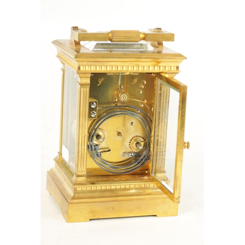 1114 - A LATE 19TH CENTURY FRENCH BRASS CASED REPEATING CARRIAGE CLOCK with filigree masked dial and enamel... 