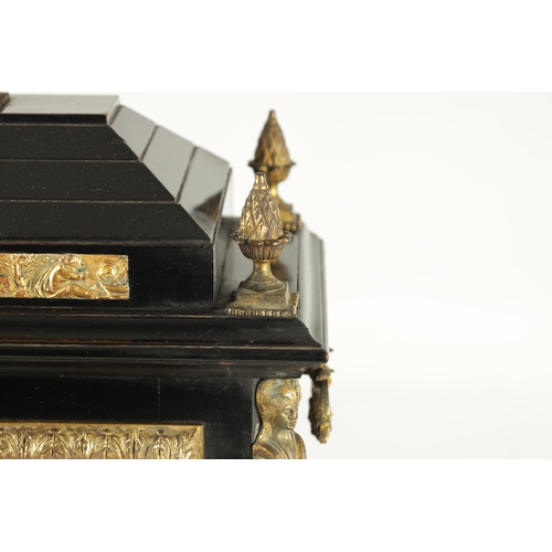 1121 - A LATE 19TH CENTURY EBONISED AND ORMOLU MOUNTED TRIPLE FUSEE BRACKET CLOCK having an angled caddy to... 