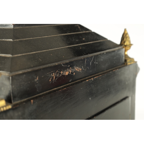 1121 - A LATE 19TH CENTURY EBONISED AND ORMOLU MOUNTED TRIPLE FUSEE BRACKET CLOCK having an angled caddy to... 