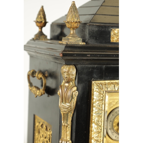 1121 - A LATE 19TH CENTURY EBONISED AND ORMOLU MOUNTED TRIPLE FUSEE BRACKET CLOCK having an angled caddy to... 