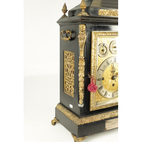 1121 - A LATE 19TH CENTURY EBONISED AND ORMOLU MOUNTED TRIPLE FUSEE BRACKET CLOCK having an angled caddy to... 