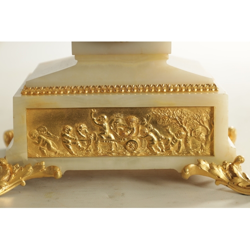 1124 - A LATE 19TH CENTURY ORMOLU MOUNTED ONYX FRENCH MANTEL CLOCK with urn finial and lion head side handl... 