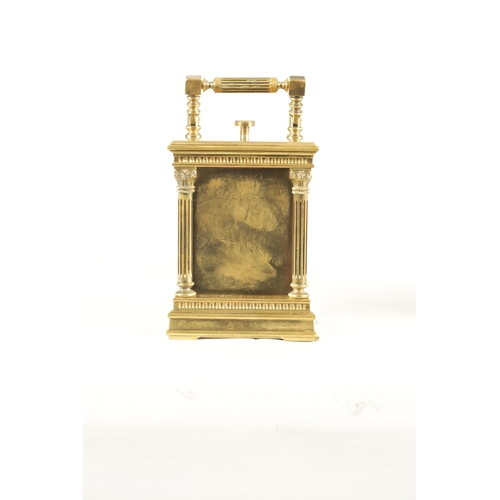 1132 - A RARE EARLY 20TH CENTURY MINUTE REPEATING MINIATURE CARRIAGE CLOCK the brass case having reeded cor... 