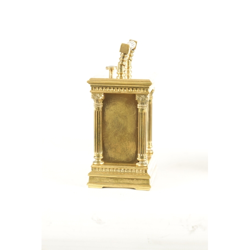 1132 - A RARE EARLY 20TH CENTURY MINUTE REPEATING MINIATURE CARRIAGE CLOCK the brass case having reeded cor... 