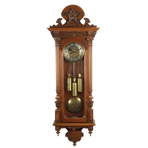 1137 - A LATE 19TH CENTURY WALNUT GRAND SONNERIE VIENNA STYLE WALL CLOCK the glazed case with shaped pedime... 