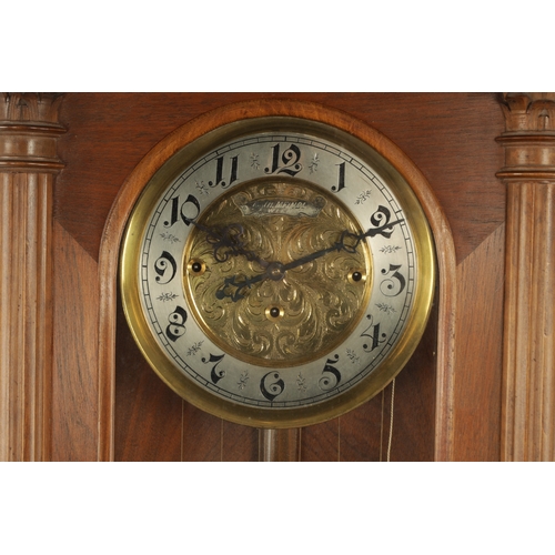 1137 - A LATE 19TH CENTURY WALNUT GRAND SONNERIE VIENNA STYLE WALL CLOCK the glazed case with shaped pedime... 