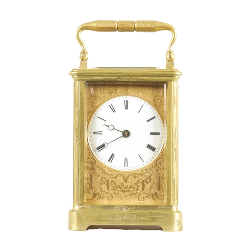 1151 - A 19TH CENTURY FRENCH ENGRAVED CASE STRIKING CARRIAGE CLOCK the floral engraved brass case with beve... 