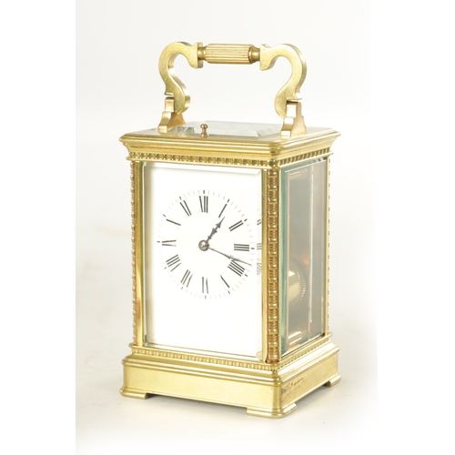 1160 - A LATE 19TH CENTURY FRENCH REPEATING CARRIAGE CLOCK the brass case with ribbed corners enclosing an ... 