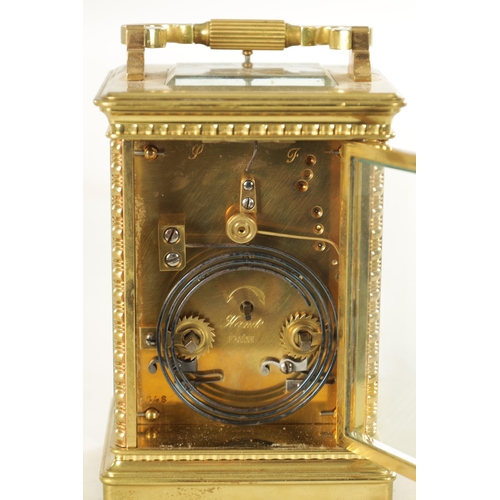 1160 - A LATE 19TH CENTURY FRENCH REPEATING CARRIAGE CLOCK the brass case with ribbed corners enclosing an ... 