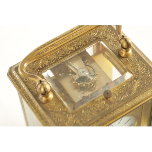 1170 - A 19TH CENTURY FRENCH ENGRAVED REPEATING CARRIAGE CLOCK the scroll engraved brass case with bevelled... 