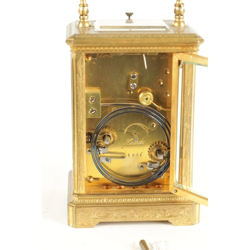 1170 - A 19TH CENTURY FRENCH ENGRAVED REPEATING CARRIAGE CLOCK the scroll engraved brass case with bevelled... 