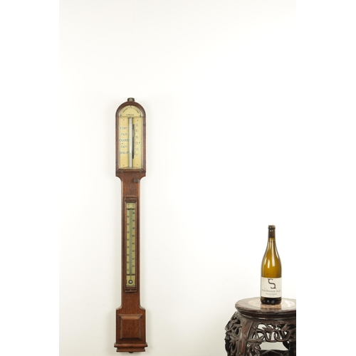 1175 - NEGRETTI & ZAMBRA, LONDON. A LATE 19TH CENTURY OAK CASE STICK BAROMETER, with calibrated ivorine bar... 