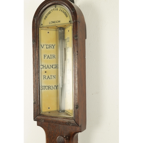 1175 - NEGRETTI & ZAMBRA, LONDON. A LATE 19TH CENTURY OAK CASE STICK BAROMETER, with calibrated ivorine bar... 