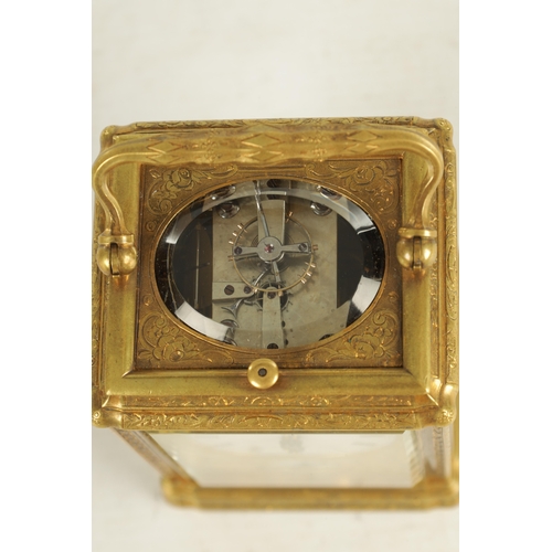 1189 - A LATE 19TH CENTURY FRENCH ENGRAVED GORGE CASED REPEATING CARRIAGE CLOCK the gilt brass foliate engr... 