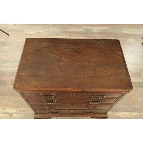 1209 - A SMALL GEORGE II MAHOGANY CHEST OF DRAWERS with brushing slide above four graduated drawers fitted ... 