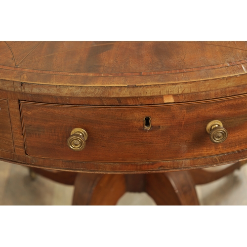 1211 - A REGENCY FIGURED MAHOGANY DRUM TABLE with a segmented inlaid top above a bank of drawers to the fri... 