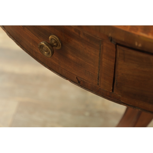 1211 - A REGENCY FIGURED MAHOGANY DRUM TABLE with a segmented inlaid top above a bank of drawers to the fri... 