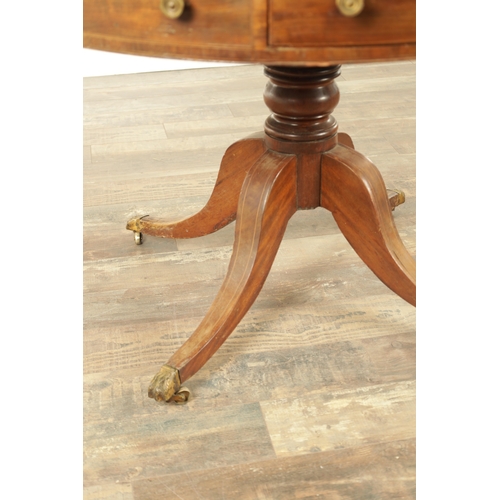 1211 - A REGENCY FIGURED MAHOGANY DRUM TABLE with a segmented inlaid top above a bank of drawers to the fri... 