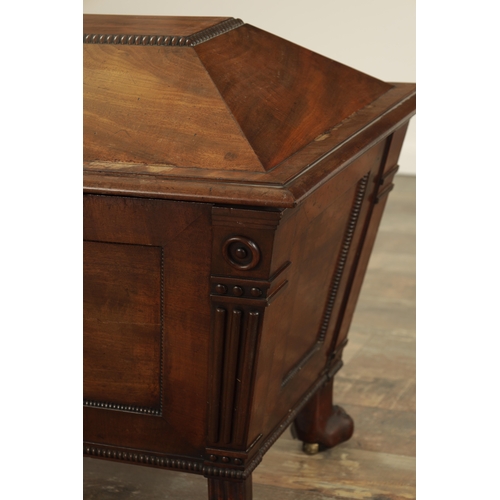 1213 - A LATE REGENCY MAHOGANY SARCOPHAGUS CELLARETTE with lead-lined divided interior, gadrooned panelled ... 