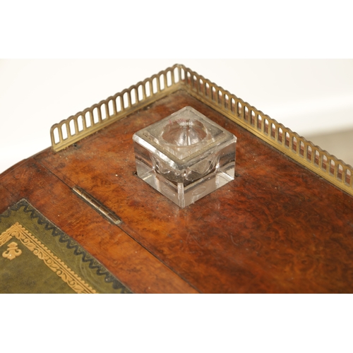 1214 - A VICTORIAN BURR WALNUT DAVENPORT with leathered writing surface scrolled carved columns and side dr... 