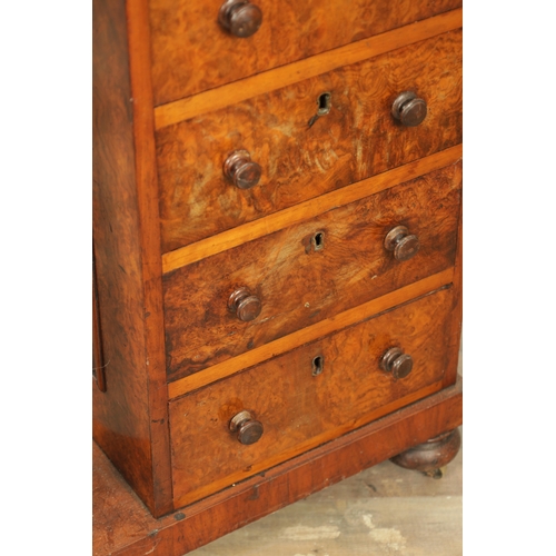 1214 - A VICTORIAN BURR WALNUT DAVENPORT with leathered writing surface scrolled carved columns and side dr... 