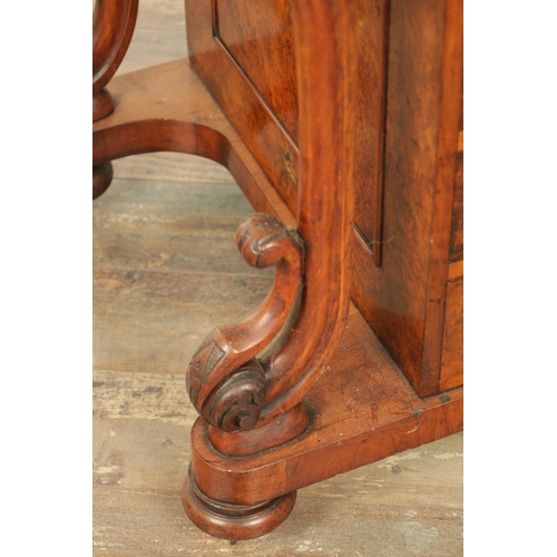 1214 - A VICTORIAN BURR WALNUT DAVENPORT with leathered writing surface scrolled carved columns and side dr... 