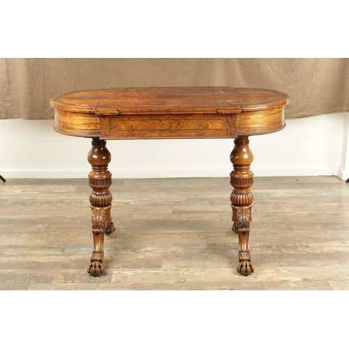 1215 - A FINE REGENCY FIGURED ROSEWOOD AND BRASS INLAID GAMES TABLE IN THE MANNER OF GILLOWS having pierced... 