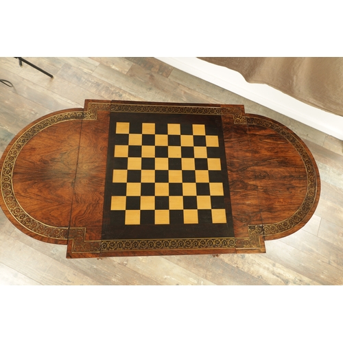 1215 - A FINE REGENCY FIGURED ROSEWOOD AND BRASS INLAID GAMES TABLE IN THE MANNER OF GILLOWS having pierced... 