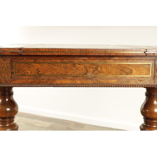 1215 - A FINE REGENCY FIGURED ROSEWOOD AND BRASS INLAID GAMES TABLE IN THE MANNER OF GILLOWS having pierced... 