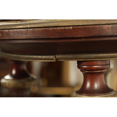 1216 - A 19TH CENTURY MAHOGANY AND BRASS MOUNTED FRENCH LAMP TABLE inset with marble top and gallery edged ... 