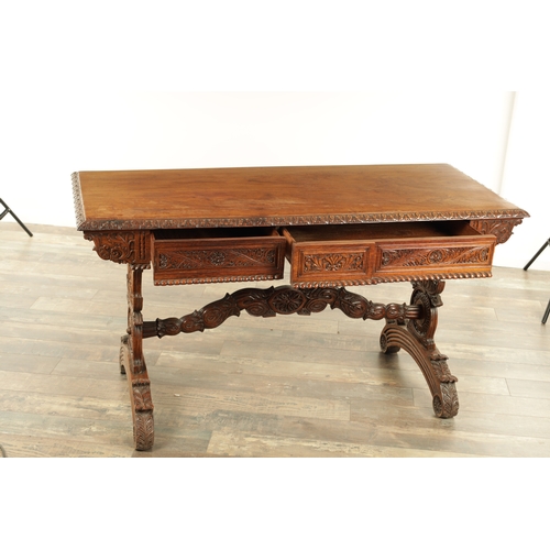 1218 - A 19TH CENTURY ANGLO INDIAN CARVED HARDWOOD LIBRARY TABLE with gadrooned leaf carved edge above frie... 