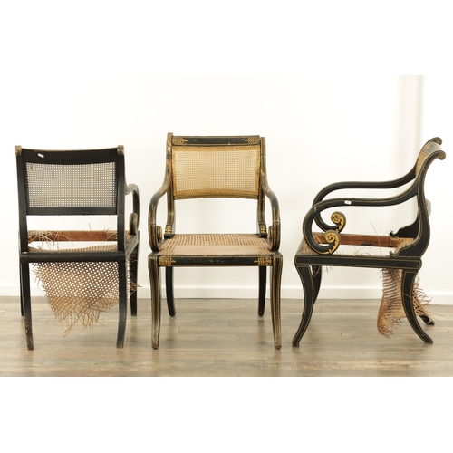 1219 - A RARE SET OF THREE REGENCY PAINTED BERGERE LIBRARY CHAIRS BY JOHN GEE painted in ebony and gilt wit... 