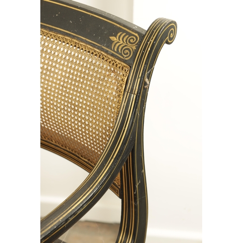 1219 - A RARE SET OF THREE REGENCY PAINTED BERGERE LIBRARY CHAIRS BY JOHN GEE painted in ebony and gilt wit... 